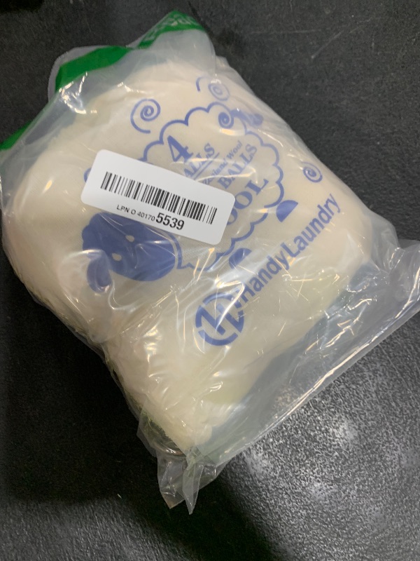 Photo 1 of Handy Laundry Wool Dryer Balls - Natural Fabric Softener, Reusable, Reduces Clothing Wrinkles and Saves Drying Time, Better Alternative to Plastic Balls and Liquid Softener (Pack of 4)