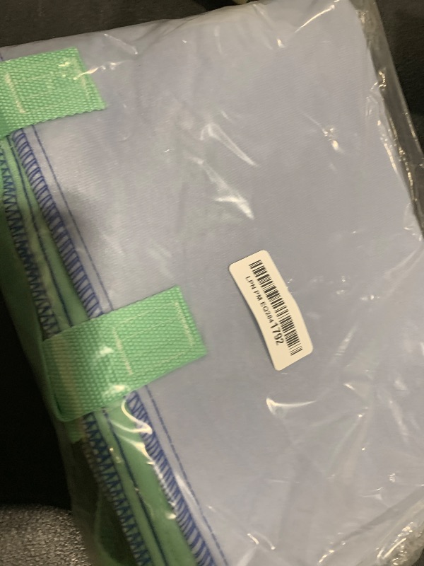 Photo 1 of Improvia Positioning Bed Pad 34"x52" with 8 Reinforced Handles, Quick-Drying, Washable, Waterproof, Reusable, Mattress Protection, for Lifting, Turning, Transfer, Elderly and Incontinence Patients.