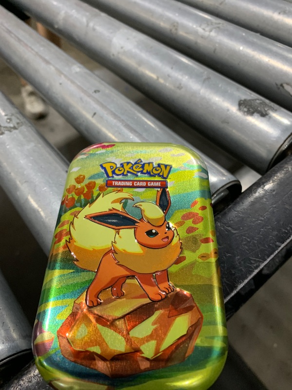 Photo 1 of Pokemon TCG Scarlet & Violet 8.5 Prismatic Evolutions Mini Tin - 1 Random Art