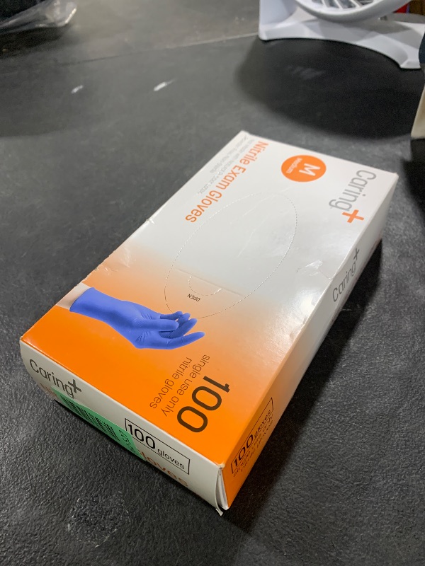 Photo 1 of Caring Nitrile Exam Gloves (100ct), Powder Free and Not Made with Natural Rubber Latex, Gloves for Medical Use, Cleaning, Food Prep and More, Medium