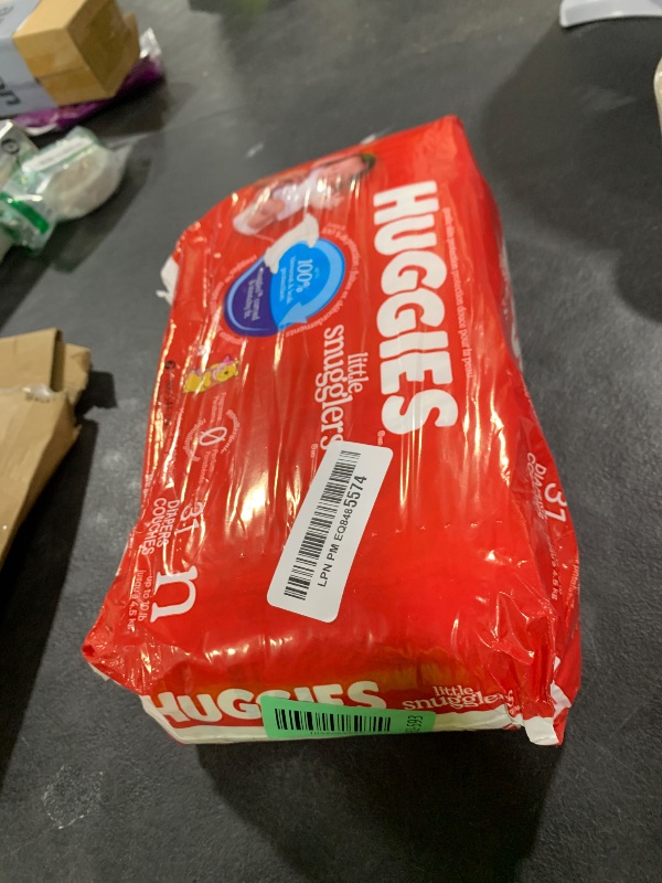 Photo 1 of Huggies Size Newborn Diapers, Little Snugglers Baby Diapers, Size Newborn (up to 10 lbs), 31 Count, Packaging May Vary