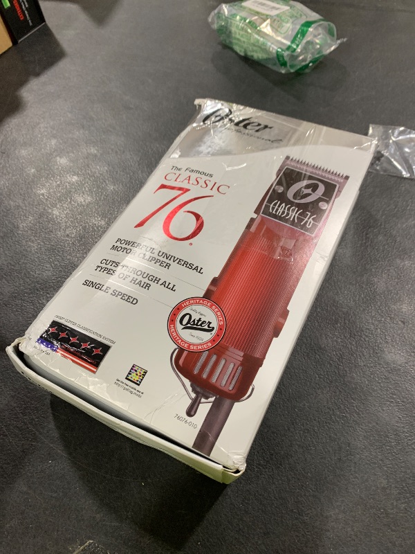 Photo 1 of OSTER Classic 76 Hair Clipper Bundle - 2 items, includes pack of 8 plastic comb blades