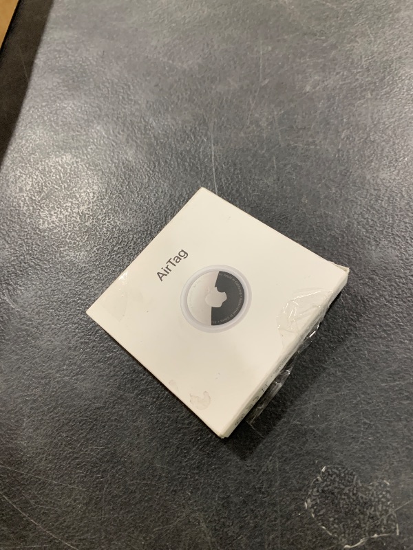 Photo 1 of Apple AirTag. Keep Track of and find Your Keys, Wallet, Luggage, Backpack, and More. Simple one-tap Set up with iPhone or iPad