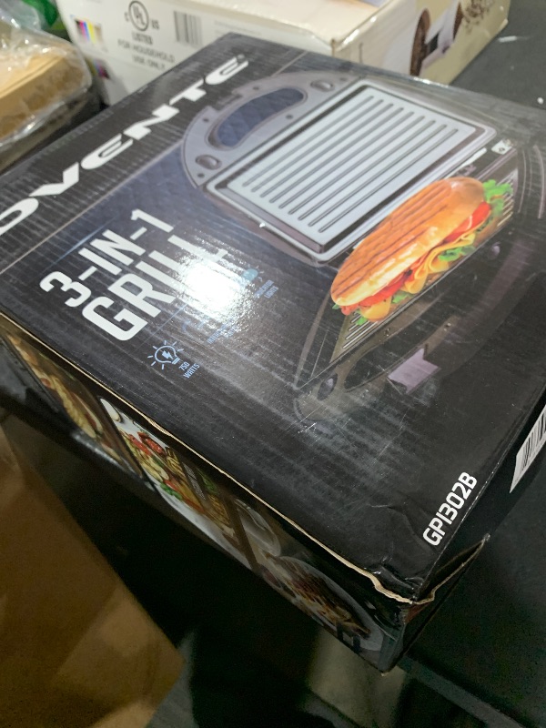 Photo 1 of OVENTE 3 in 1 Electric Sandwich Maker, Panini Press Grill and Waffle Iron Set with Removable Non-Stick Plates, Perfect for Cooking Grilled Cheese, Tuna Melts, Burgers, Steaks and Snacks, Black GPI302B