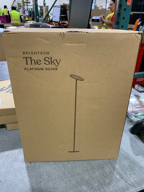 Photo 1 of Brightech Sky LED Floor lamp, Torchiere Super Bright Floor Lamp for Living Rooms & Offices - Dimmable, Tall Standing Lamp for Bedroom Reading - Platinum Silver