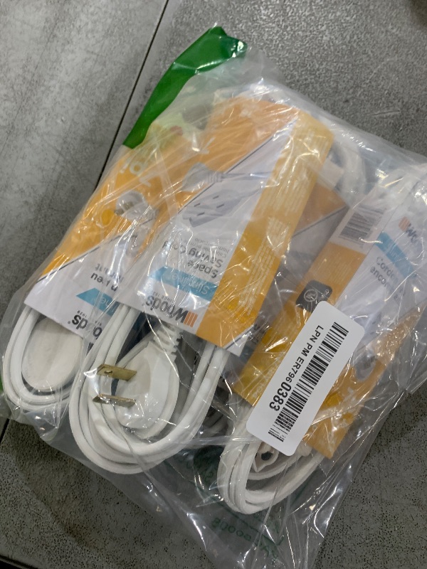Photo 1 of Woods SlimLine Extension Cord - 16/2 Indoor Flat Plug with Right Angled Design - 3 Grounded Outlets - Space Saving Profile - UL Listed - 13 Amp - 125 Volt - White - 7 Feet