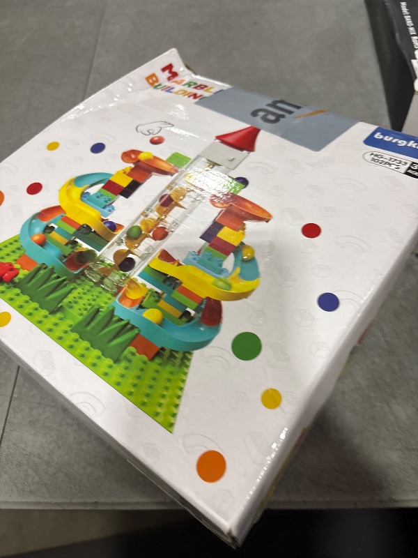 Photo 1 of Electric Marble Run with Automatic Elevator Lift - STEM Building Toy for Kids Ages 4-8, 102 PCS Construction Set with 10 Marbles & Transparent Track, Compatible with Standard Building Blocks