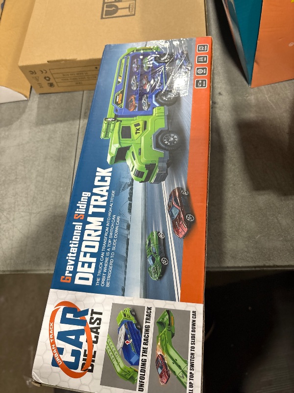 Photo 1 of Toddler Car Truck Toys,Car Carrier Truck Toys for Kids Age 3-5 4-8,Foldable Car Track Sets with 2.8-Ft Race Track and 6 Die-Cast Race Cars, Truck Toys Gifts for 3 4 5 6 7 8+ Year Old Boys Girls(Green)