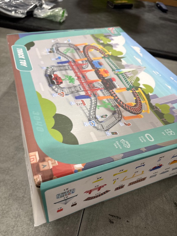 Photo 1 of Electric Toddler Train Set Toy, Battery Powered Railway Train Track Toy Playset for Kids Ages 3 4 5, Boys and Girls