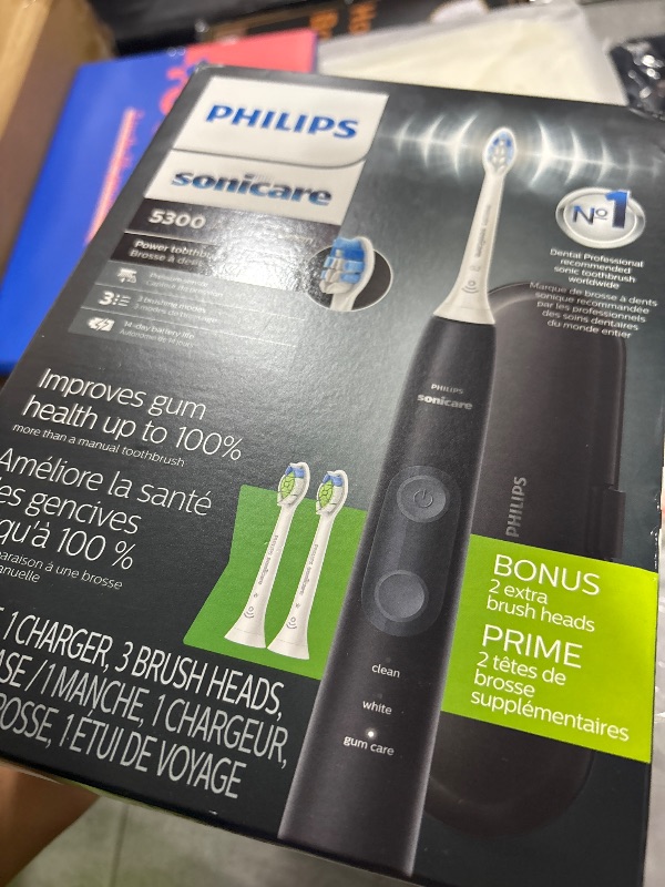 Photo 1 of Philips Sonicare ProtectiveClean 5300 Rechargeable Electric Toothbrush, with Pressure Sensor, 3 Cleaning Modes, SmarTimer and QuadPacer, with 2 Bonus Brush Heads, Travel Case, Black, Model HX6423/34