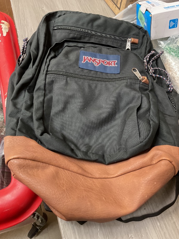 Photo 1 of JanSport Cool Backpack, with 15-inch Laptop Sleeve - Large Computer Bag Rucksack with 2 Compartments, Ergonomic Straps, Black