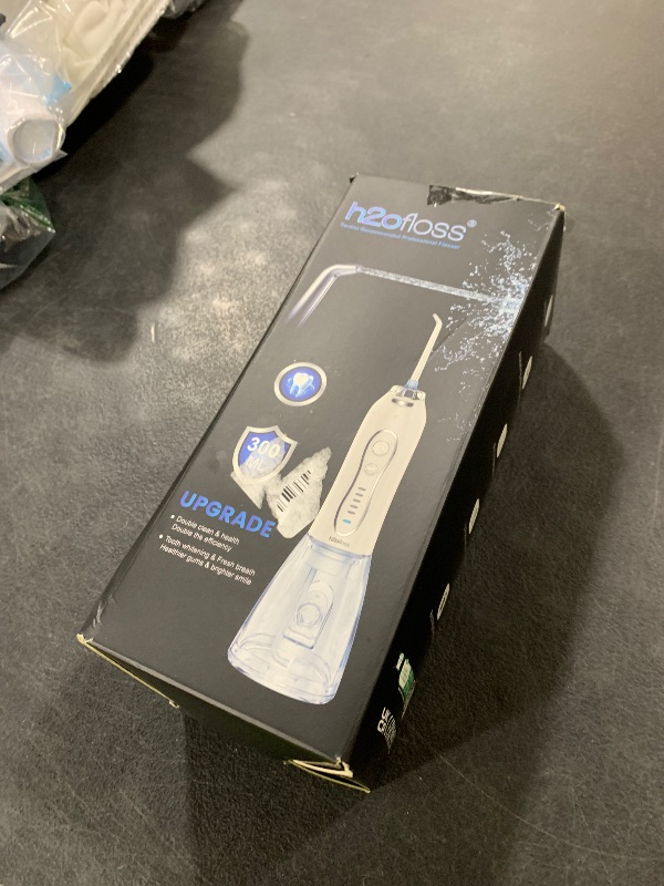Photo 1 of H2ofloss Water Dental Flosser Portable Dental Oral Irrigator with 5 Modes, 6 Replaceable Jet Tips, Rechargeable IPX7 Waterproof Teeth Cleaner for Home and Travel -300ml Detachable Reservoir (HF-6)