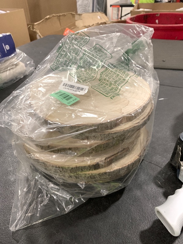 Photo 1 of KARAVELLA (10) Pack 10-11 inches Large Wood Slices for Centerpieces - Wood Centerpieces for Tables, Rustic Wedding Centerpiece, Natural Wood Slabs