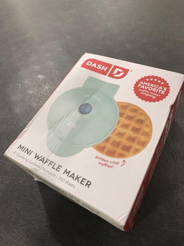 Photo 1 of DASH Mini Waffle Maker - 4” Waffle Mold, Nonstick Waffle Iron with Quick Heat-Up, PTFE Nonstick Surface - Perfect Mini Waffle Maker for Kids and Families, Just Add Batter (Aqua)