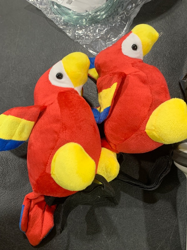 Photo 1 of parrot plush with velcro strap
