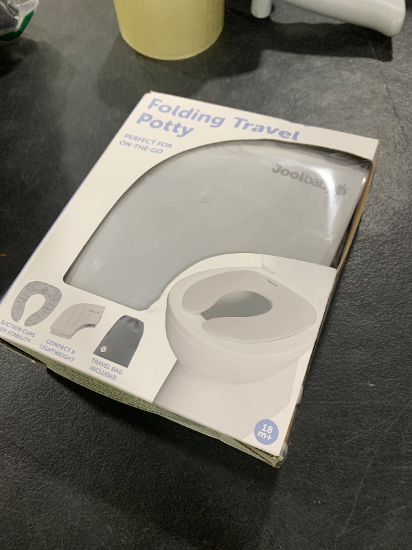 Photo 1 of Jool Baby Folding Travel Potty Training Seat for Toddlers, Fits Round & Oval Toilets, Non-Slip Suction Cups, Includes Free Travel Bag (Gray)
