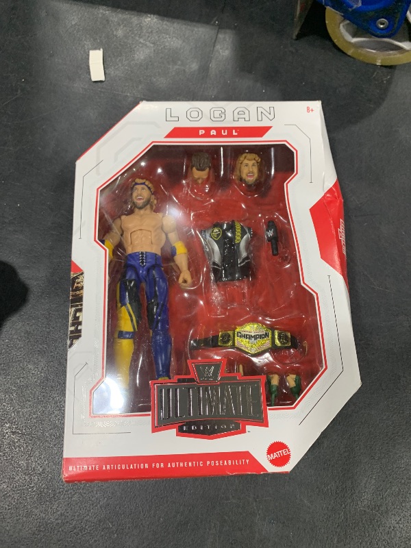 Photo 1 of Mattel WWE Elite Collection Top Picks Action Figure & Accessories Set, Logan Paul 6-inch Collectible with Swappable Hands, Ring Gear & 25 Articulation Points