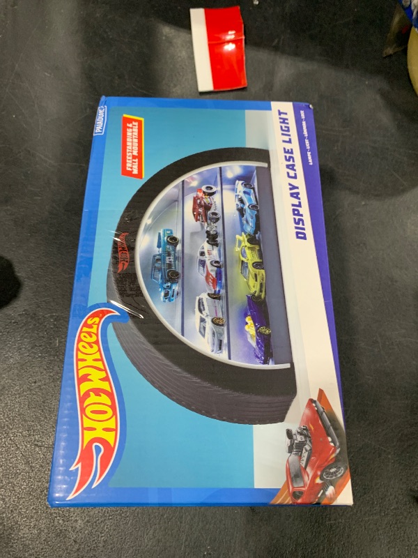 Photo 1 of Hot Wheels Display Case Light - Officially Licensed Mattel Merchandise, Light Up Case Holds 8 Cars, Wheel Shaped Wall Mountable or Freestanding, Gift for Collectors