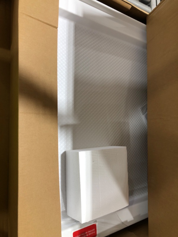 Photo 1 of DreamLine SlimLine 32 in. D x 54 in. W x 2 3/4 in. H Center Drain Single Threshold Shower Base in White, DLT-1132540