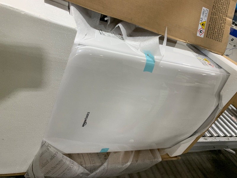Photo 1 of Amazon Basics 4-In-1 Portable Air Conditioner, 13500 BTU (ASHRAE), Cools Up to 550 Sqf, Portable AC with Cool/Heat/Dry (Dehumidifier)/Fan-Only Functions, Auto Mode, Sleep Mode, Timer, White