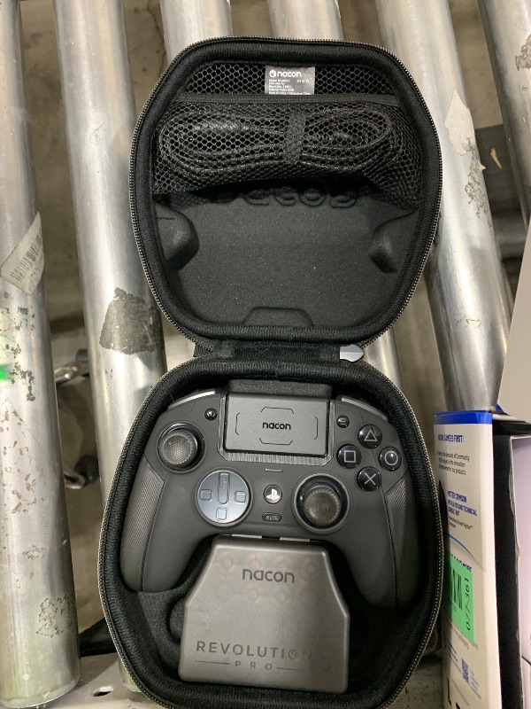 Photo 1 of NACON Revolution 5 Pro Officially Licensed PlayStation Wireless Gaming Controller for PS5 / PS4 / PC - Hall Effect, Trigger Stops, Mappable Buttons, Bluetooth Audio - Triple Black