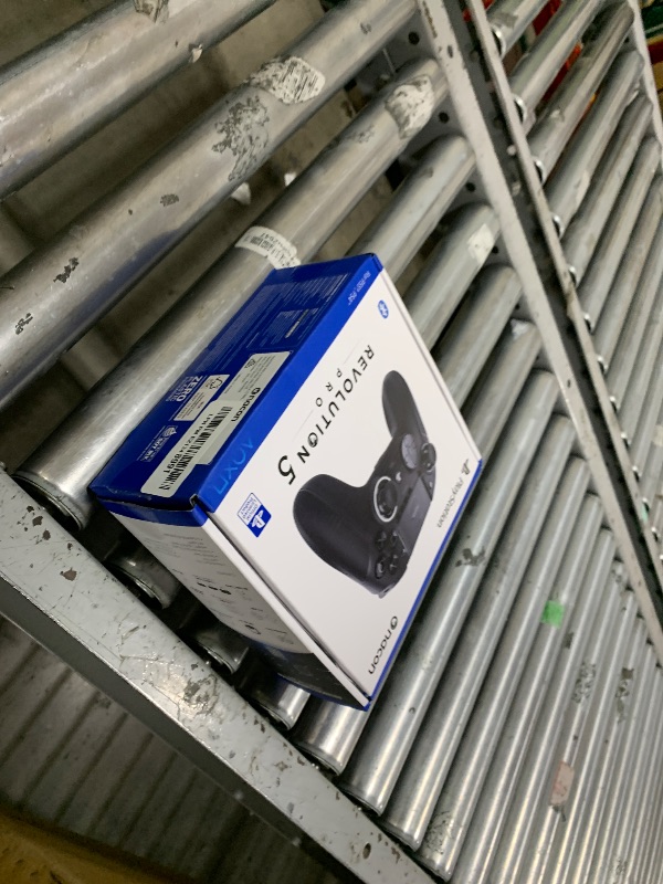 Photo 1 of NACON Revolution 5 Pro Officially Licensed PlayStation Wireless Gaming Controller for PS5 / PS4 / PC - Hall Effect, Trigger Stops, Mappable Buttons, Bluetooth Audio - Triple Black