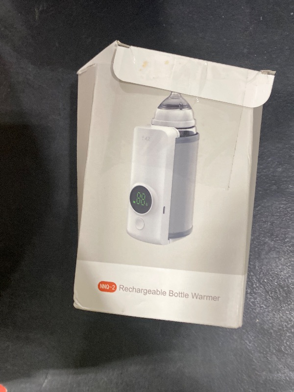 Photo 1 of Portable Bottle Warmer for Travel, Fast Warming Comfortable Baby Feeding On The Go, Waterless Milk Warming with Battery-Powered for Home Outdoor