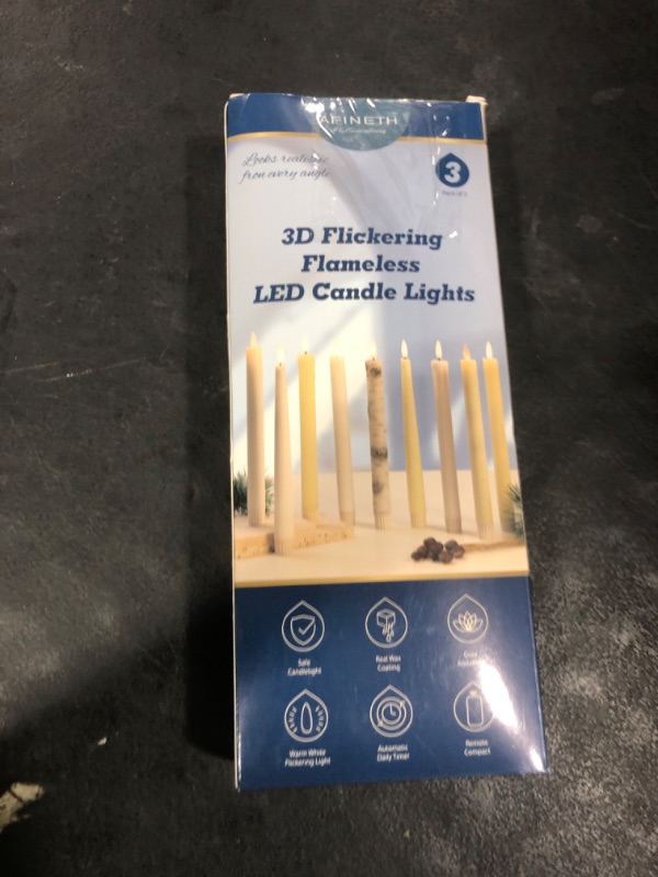 Photo 1 of AFINETH Flameless Taper Candles, 9.6" Real Wax Battery Operated, 3 Pack Led Candles with 3D Wick, Flickering, Ivory
