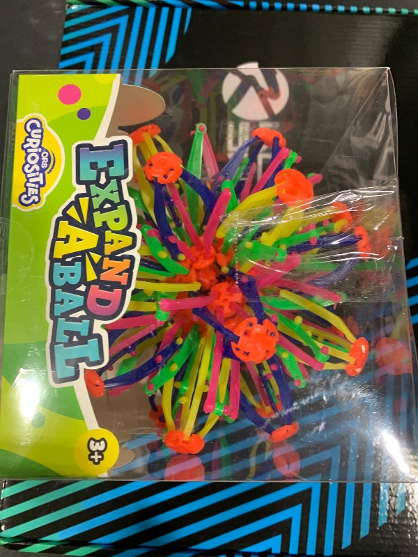 Photo 1 of ORB Curiosities Jumbo Expand-A-Ball - More Than Doubles in Size from 6" to 14"- Expandable Sensory & Fidget Sphere and Breathing Ball Toy - Great for Breathing Exercises and Play for Kids and Adults