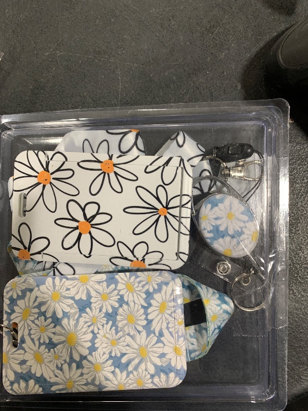 Photo 1 of Uniclife 2 Pack Floral Sliding Badge Holder White Blue Flower Plastic Case with Retractable Badge Reel Carabiner Clip and Detachable Lanyard Strap Hard Vertical Card Protector
