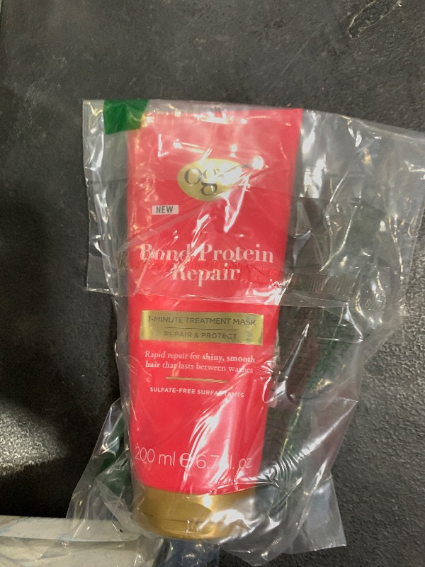 Photo 1 of OGX Repair & Protect Bond Protein Repair 1-Minute Treatment Mask, Deep Conditioning Hair Mask Rapidly Repairs for Shiny, Smooth Hair That Lasts Between Washes, 6.7 fl. oz
