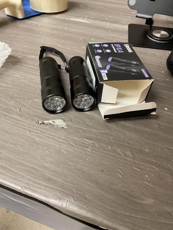 Photo 1 of COSOOS 2 Pack UV Flashlight, 12 LED Handheld Blacklight Flashlight 395nm Mini Light Torch Detector for Dog Pet Urine Stains, Bed Bugs and Scorpions. (Batteries not Included)