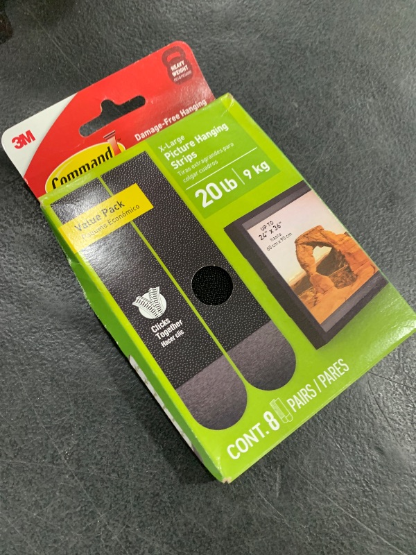 Photo 1 of Command 20 lb XL Heavyweight Picture Hanging Strips 8 Pairs (16 Command Strips), Damage-Free Hanging Picture Hangers, Heavy Duty Great for Home Decor, Black Adhesive