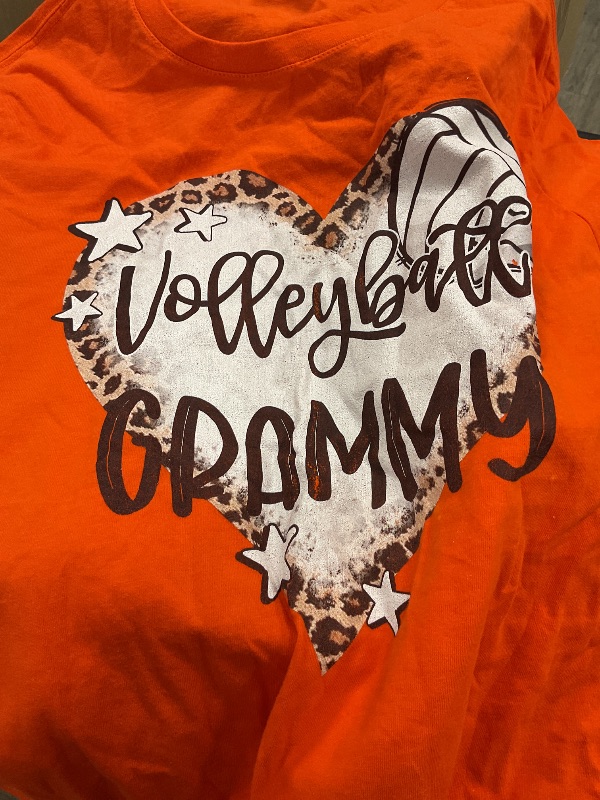 Photo 1 of Woman’s  Large Orange volley ball t shirt 