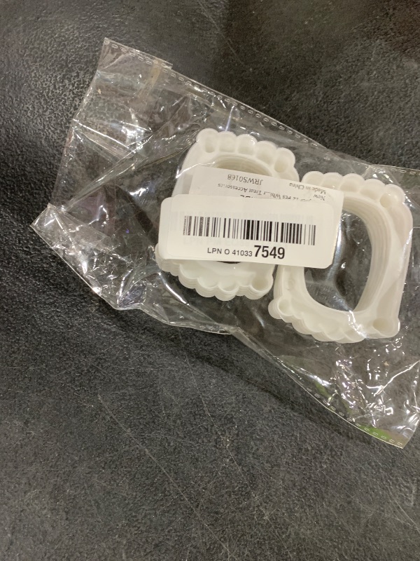 Photo 1 of Kreyfer 12 Pcs White Fake Vampire Teeth Fangs - Halloween Vampire Plastic Teeth for Kids, Fun Cosplay Props, Party Favors and Trick or Treat Accessories