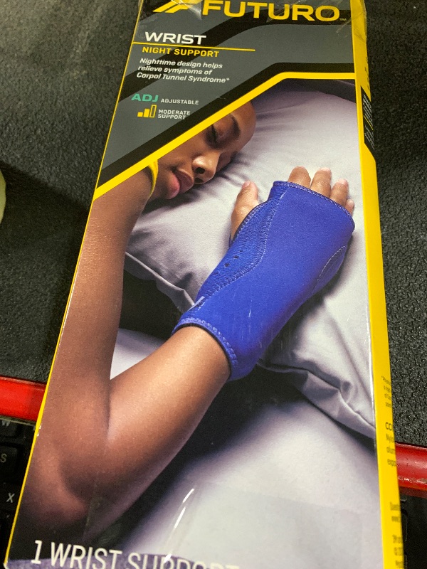 Photo 1 of FUTURO Night Wrist Support, Left or Right, Adjustable, Helps Provide Nighttime Relief of Carpel Tunnel Symptoms, Made of Breathable Material, Easy-to-Use Sleeve Design, One Size Fits Most (48462ENR)