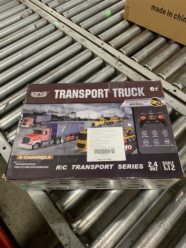 Photo 1 of RC Semi Truck with Trailer - 22.5 Inch Toy for Kids, Carrier Van Transport Vehicle with 2 Rechargeable Batteries, 1:24 Container Truck with LED Lights & Music, Great Gift For Boys & Girls