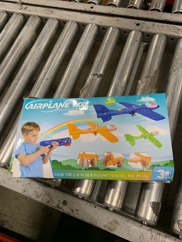 Photo 1 of Fuwidvia 3 Pack Airplane Launcher Toys, 13.2'' LED Foam Glider Plane Toy for Boys, 2 Flight Modes Outdoor Flying Toys Birthday Gifts for Boys Girls 4 5 6 7 8 9 10 11 12 Year Old (Blue&Green&Orange)