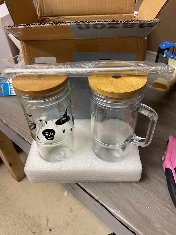 Photo 1 of SEE PICTURE………… 24oz Glass Cups with Lids and Straws,Glass Tumbler with Handle,2 set–Reusable Glass Ice Coffee Cups with Lid and Straw for Smoothies,Tea,Juice,Boba Cup for Cold & Hot Drinks,Travel Cup one tumbler Halloween theme 