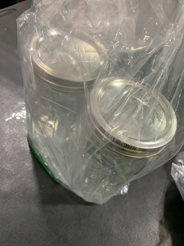Photo 1 of Ball Wide Mouth Glass Mason Jars with Lids and Bands, Used for Canning, Pickling, Juice, Jam, Jelly, Quart Size 32 Ounce (Pack of 2)