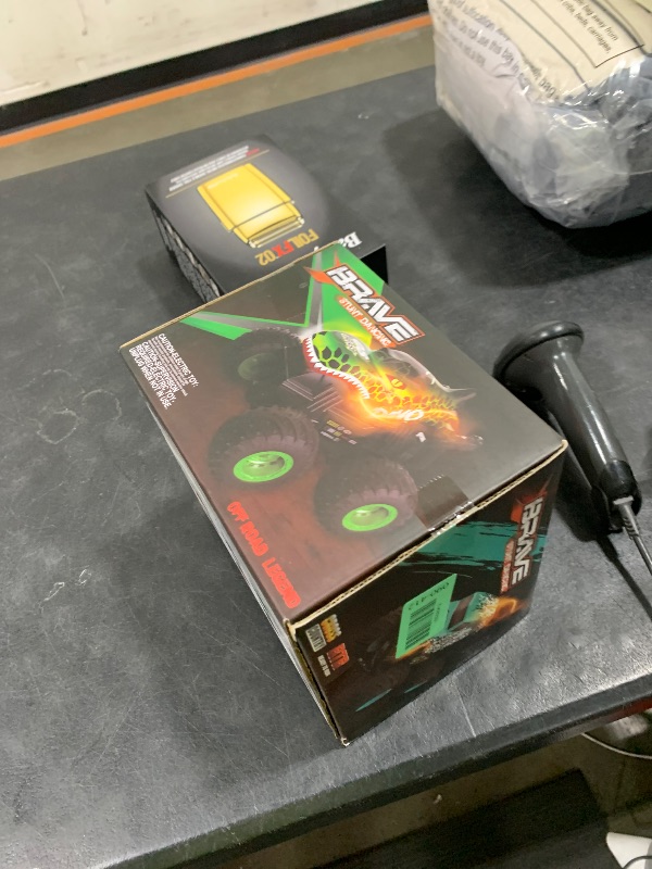 Photo 1 of BEZGAR Monster Truck Toys - Remote Control Monster Truck with Light & Music, Dinosaur Toys for Kids, 1:20 Scale RC Truck with 360° Spins and Drifting, Remote Control Car for Boys 4-7