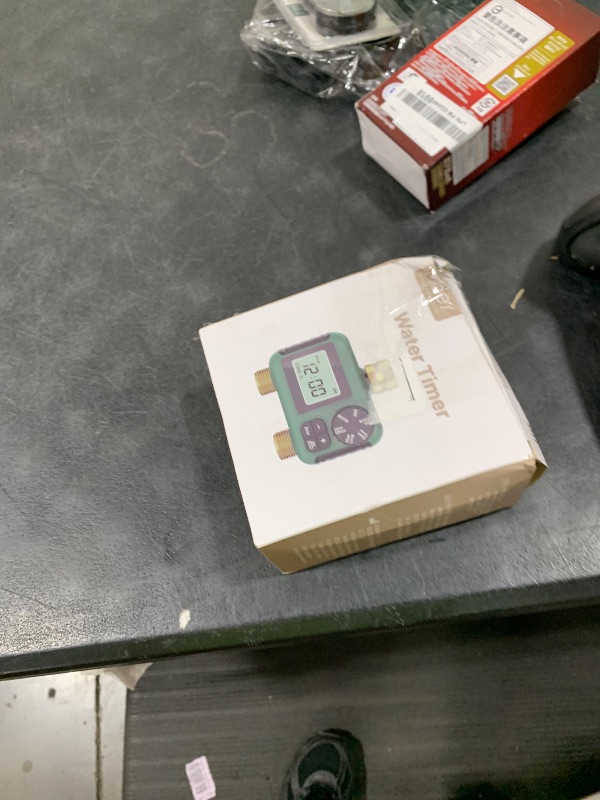Photo 1 of MOES 2 Outlet Sprinkler Timer, Brass Inlet & Outlet, Programmable Automatic Irrigation Controller, Rain Delay, Manual Watering, 2 Zone Water Hose Timer for Gardens, Lawns, and Hose Systems