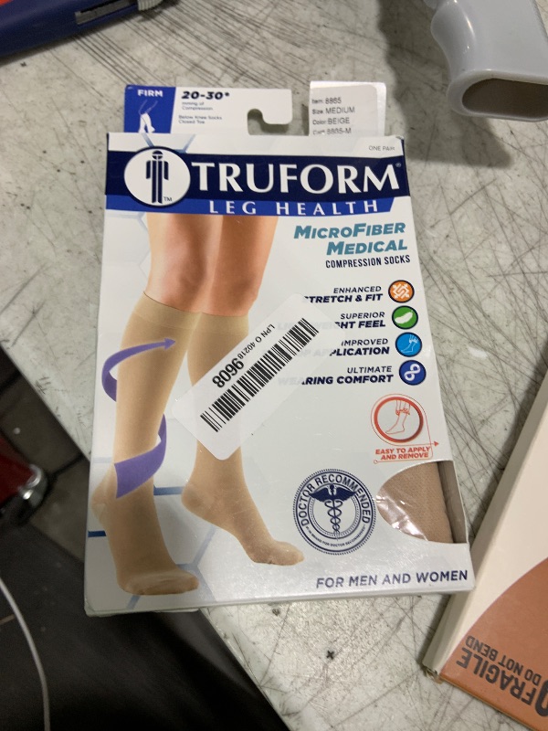 Photo 1 of Truform 20-30 mmHg Compression Stockings for Men and Women, Knee High Length, Closed Toe, Beige, Medium