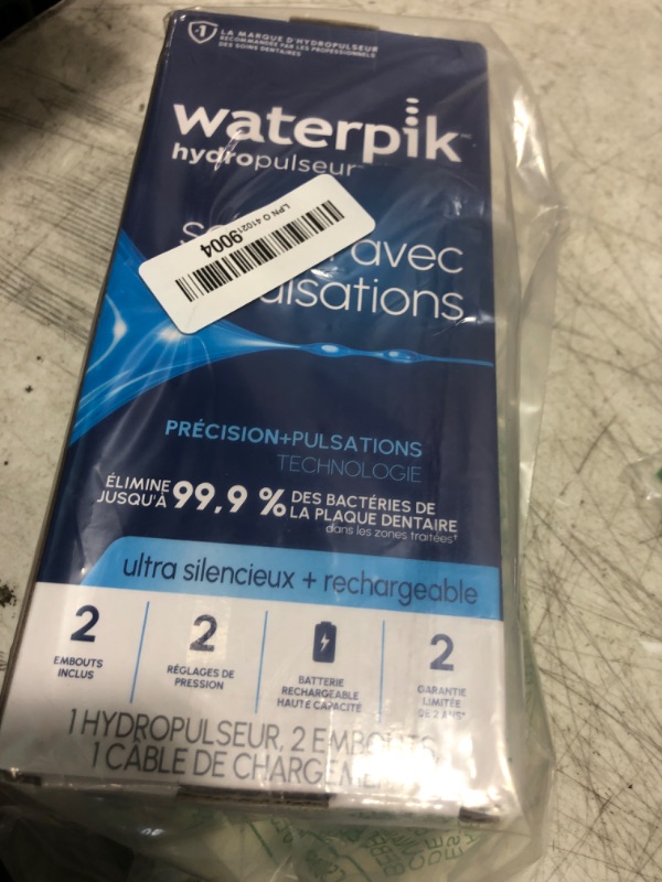 Photo 1 of Waterpik Cordless Pulse Rechargeable Portable Water Flosser for Teeth, Gums, Braces Care and Travel with 2 Flossing Tips, Waterproof, ADA Accepted, WF-20 White, Packaging May Vary