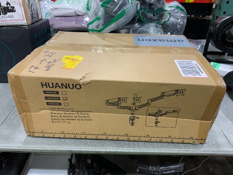 Photo 1 of HUANUO Triple Monitor Stand - Full Motion Articulating Gas Spring Monitor Mount Fit Three 17 to 32 inch LCD Computer Screens with Clamp, Grommet Kit