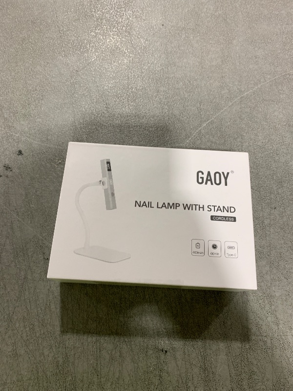 Photo 1 of GAOY Cordless Nail Lamp with Stand, Mini Handheld UV Light with LCD Display for Gel Nails, Rechargeable USB Nail Dryer for Fast Curing, Silver