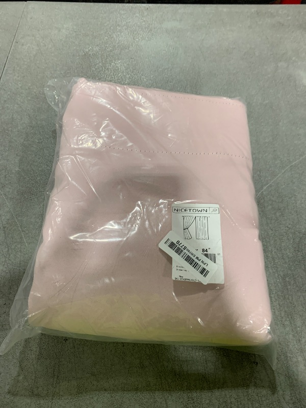 Photo 1 of Blackout Curtain Panels for Girls Room Baby Pink 52W 84L 2 Panels Noise Reducing Back Tab Blackout Draperies by NICETOWN