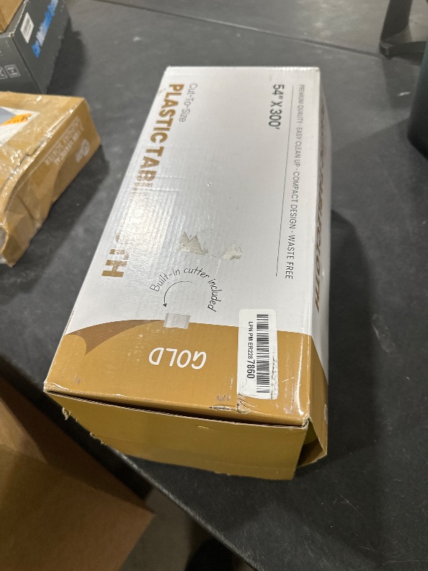Photo 1 of Exquisite Party Solids 54 Inch X 300 Feet Gold Plastic Table Cover Roll in A Cut - to - Size Box with Convenient Slide Cutter. Cuts Up to 36 Rectangle 8 Feet Plastic Disposable Tablecloths