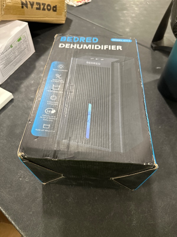 Photo 1 of Dehumidifier,95OZ Dehumidifier for Home 1000 Sq.Ft - Quiet with Auto Shut Off & Relaxing 7 Color Ambient Light,Ideal for Livingroom, Bedroom, Basement(Black)