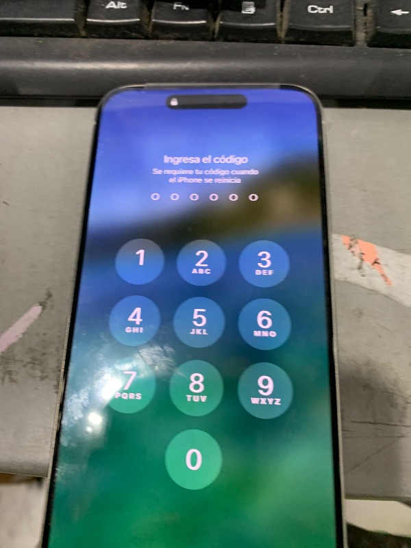 Photo 1 of Apple iPhone 15 Pro Max, 1TB, White Titanium - locked (Renewed Premium) PASSCODE ACTIVATED